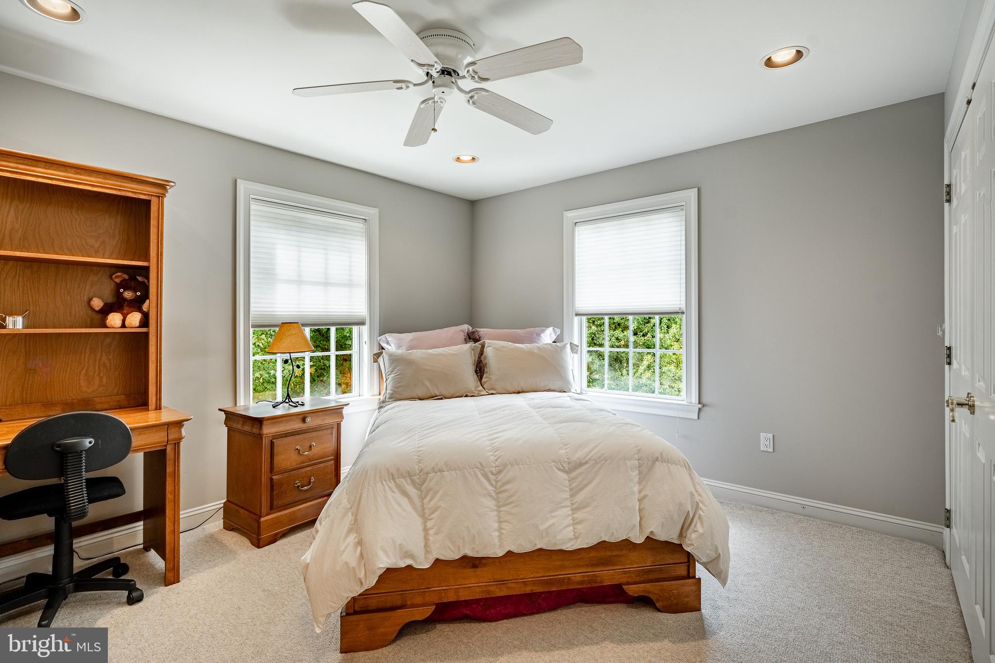 37 Ruth Circle Malvern, PA 19355 - Photo 44 of 63 a bedroom with a bed a chandelier and a window