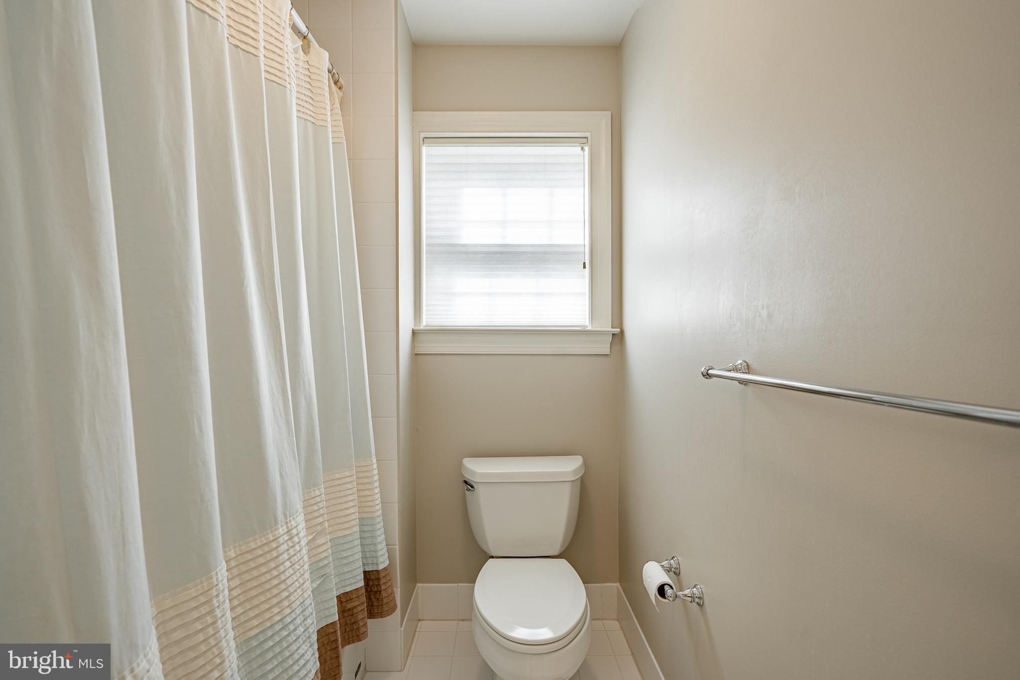 37 Ruth Circle Malvern, PA 19355 - Photo 47 of 63 a white toilet sitting next to a shower