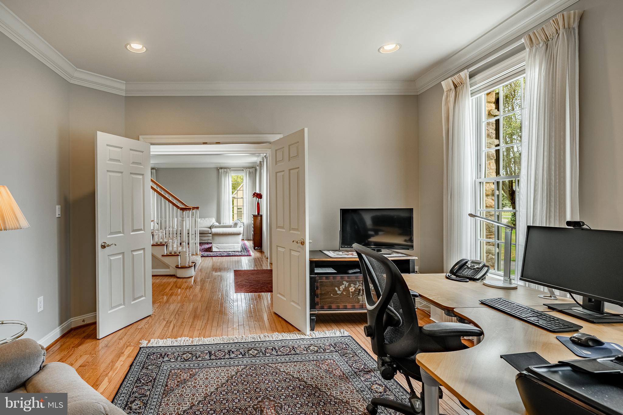 37 Ruth Circle Malvern, PA 19355 - Photo 6 of 63 a view of a livingroom with workspace and a window