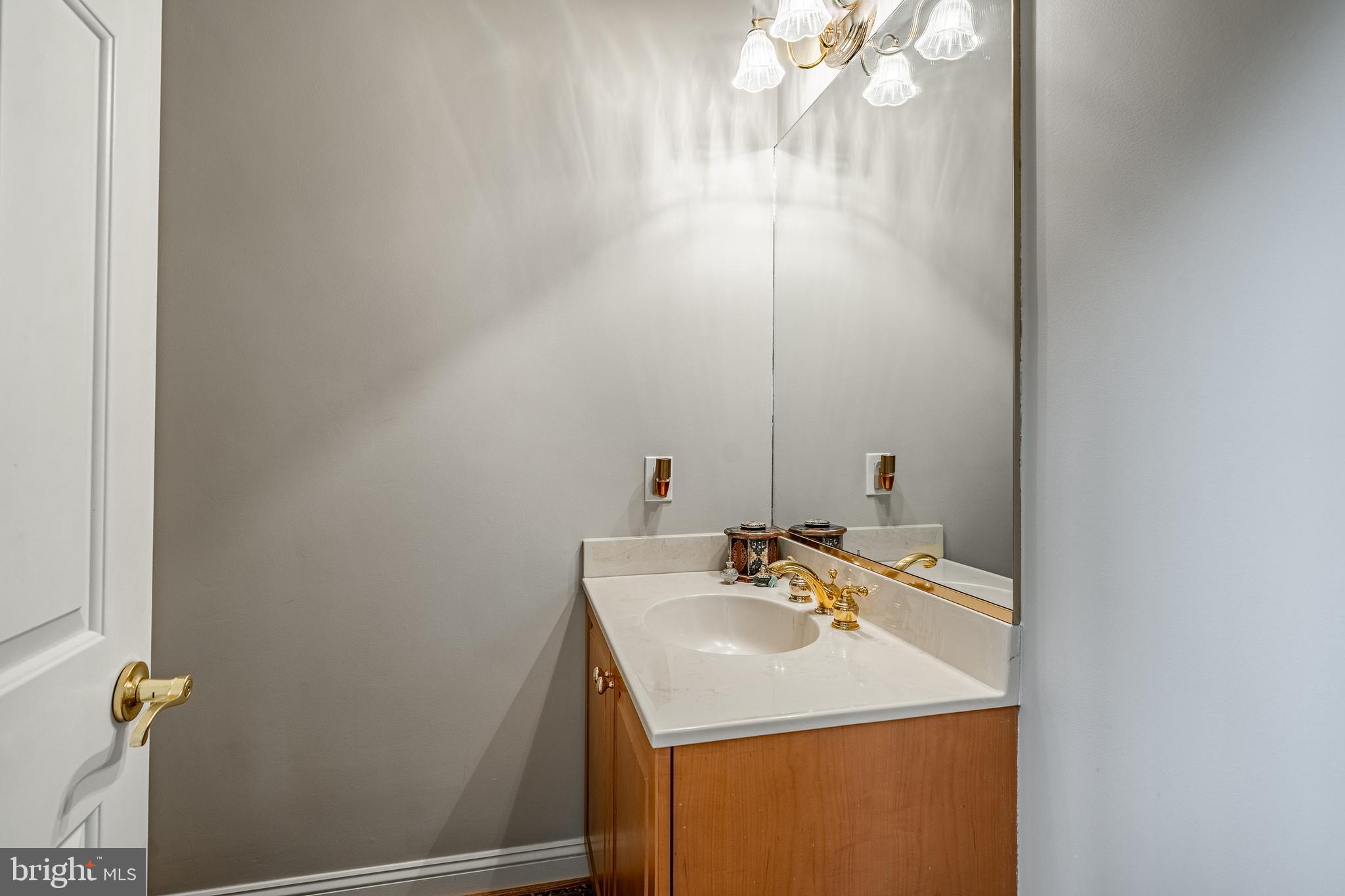 37 Ruth Circle Malvern, PA 19355 - Photo 9 of 63 a bathroom with a sink and a mirror