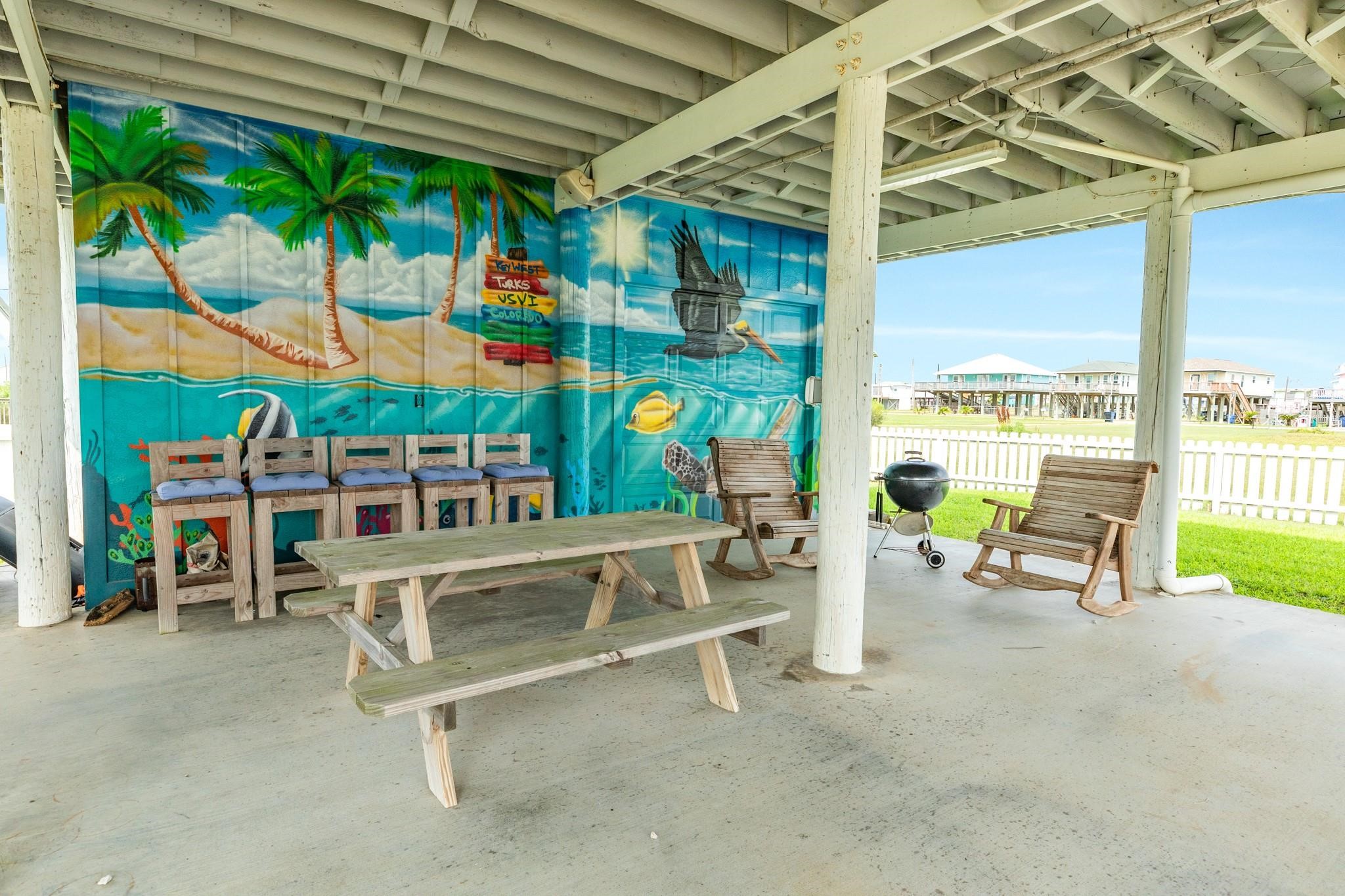 307 Angel Wing Street Surfside Beach, TX 77541 - Photo 18 of 23 an outdoor seating area with furniture