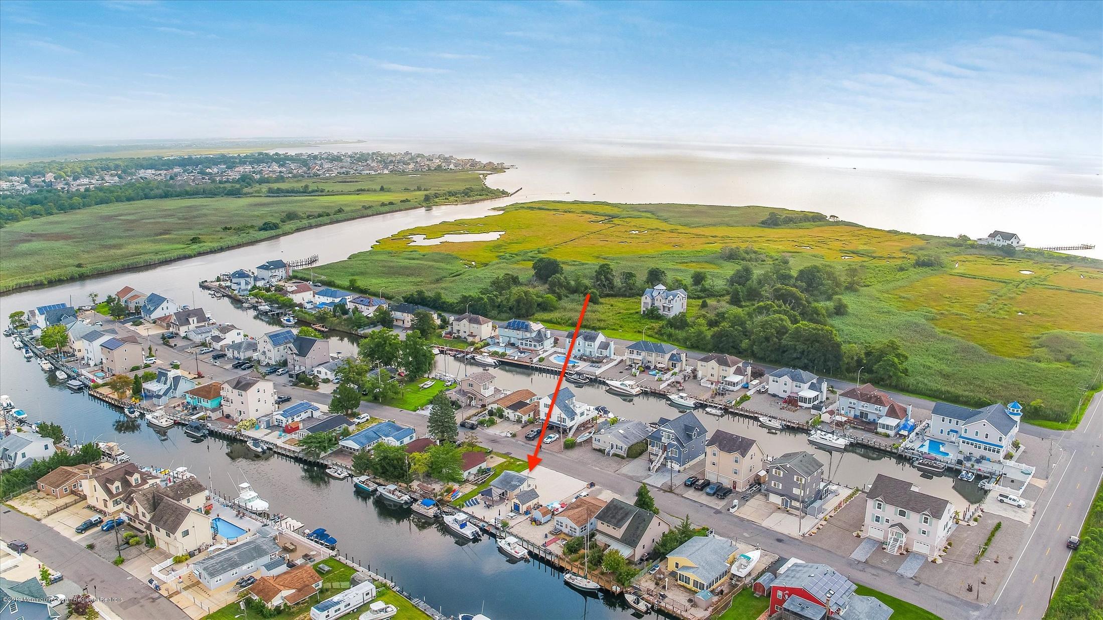 11 Compass Road Waretown, NJ 08758 - Photo 6 of 38 a view of a city with an ocean