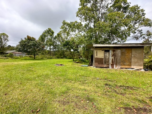 11-3239 4th Street Volcano, HI 96785 - Photo 19 of 22 a front view of a house with yard