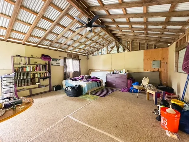a view of a garage with gym equipment