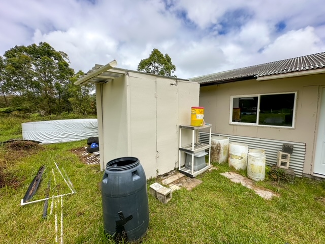 11-3239 4th Street Volcano, HI 96785 - Photo 10 of 22 a backyard of a house with seating space