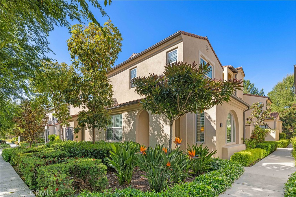65 Tallowood Irvine, CA 92620 - Photo 1 of 1 a front view of a house with a yard