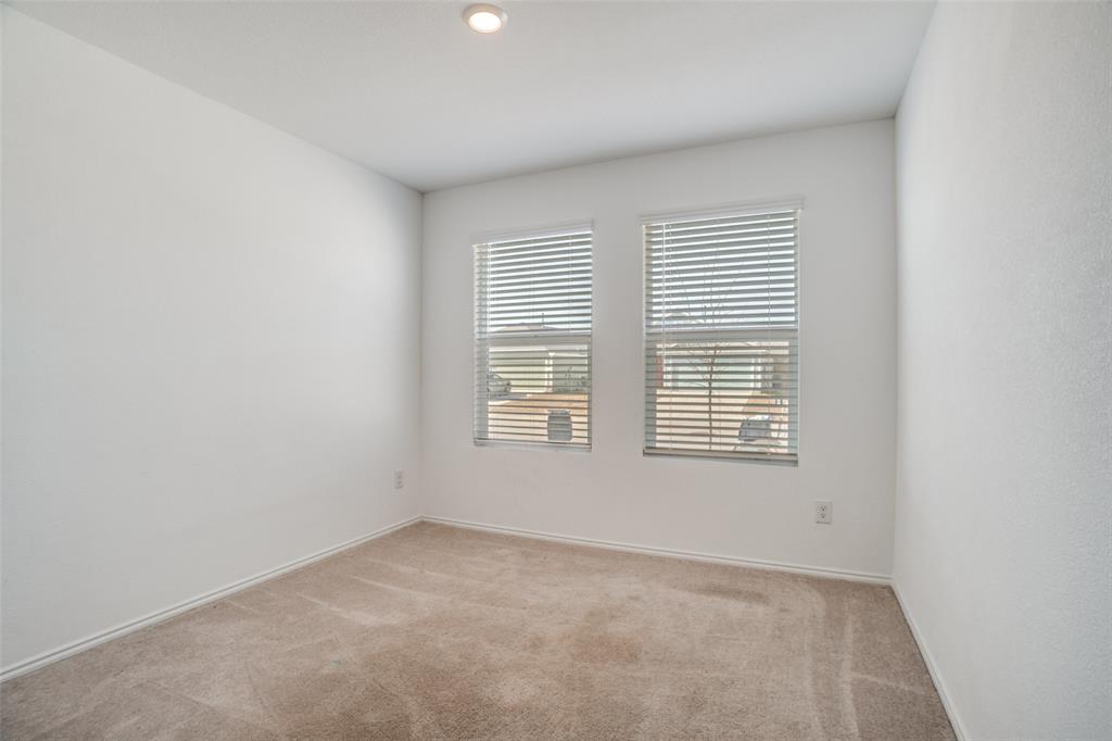 1201 Catclaw Road Princeton, TX 75407 - Photo 11 of 20 an empty room with a window