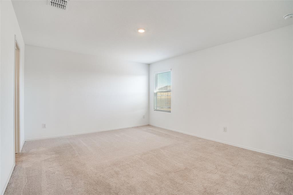 1201 Catclaw Road Princeton, TX 75407 - Photo 14 of 20 an empty room with windows