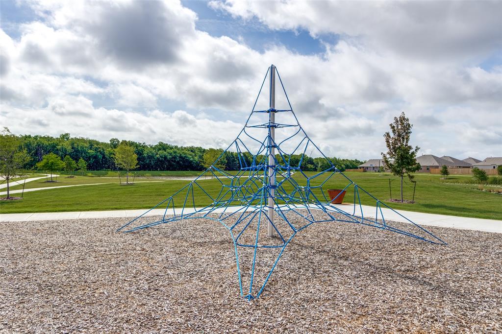 1201 Catclaw Road Princeton, TX 75407 - Photo 19 of 20 a view of a park with swings and slides