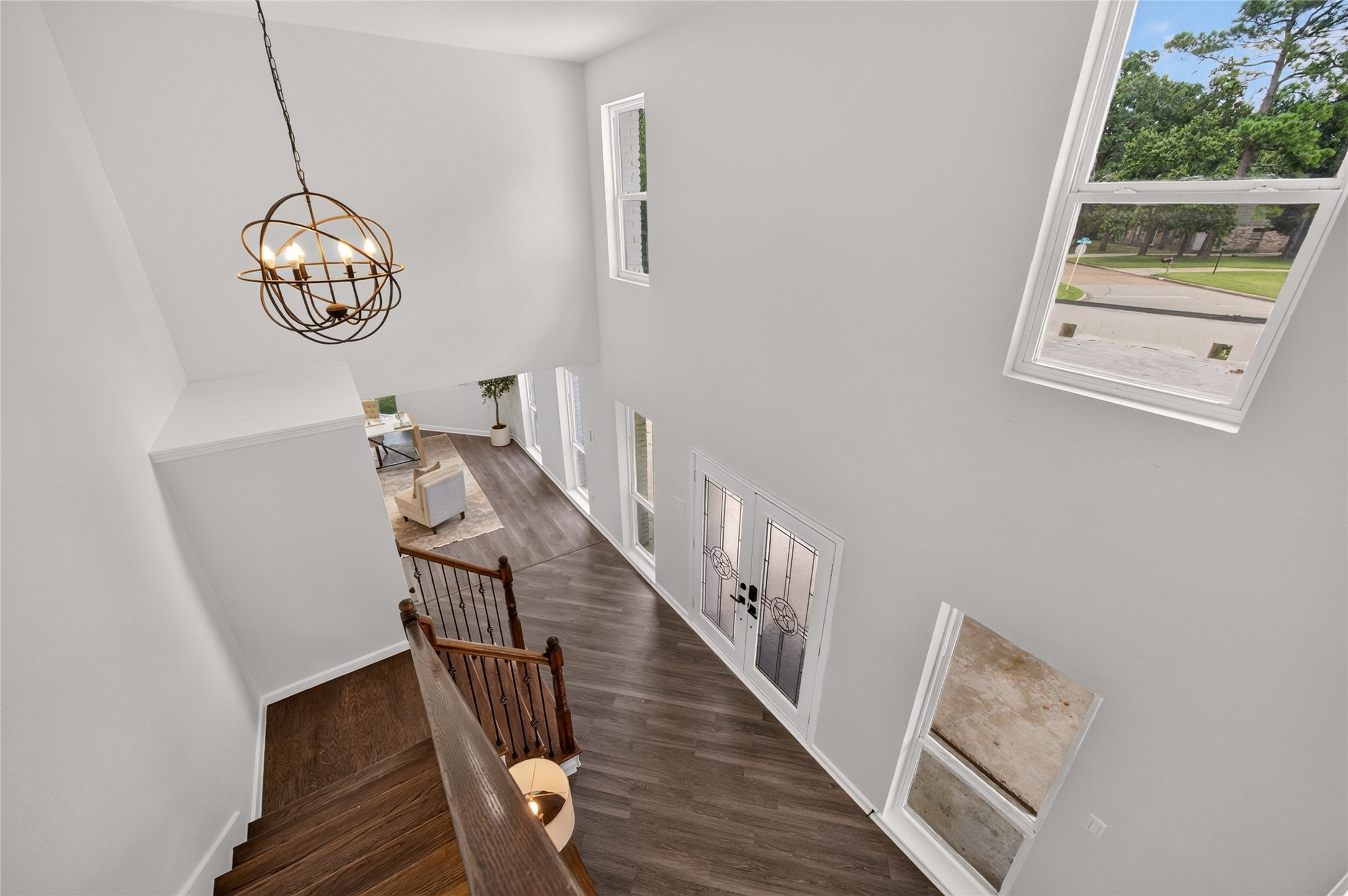 8002 Lichen Lane Spring, TX 77379 - Photo 8 of 50 View from the top of the stairs down to the entrance.