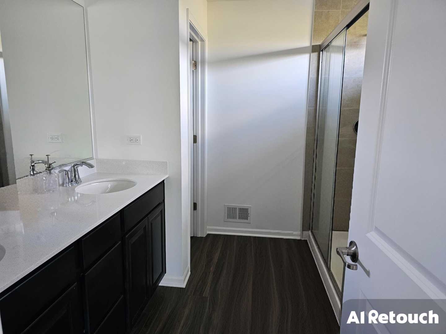 81 Sweetflag Circle Elgin, IL 60124 - Photo 8 of 9 a bathroom with a sink and a mirror