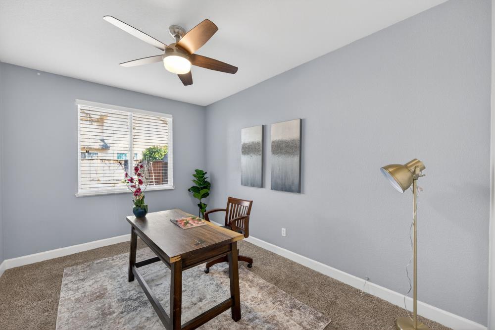 3045 Delta Tule Way Sacramento, CA 95834 - Photo 24 of 65 a living room with furniture and a window