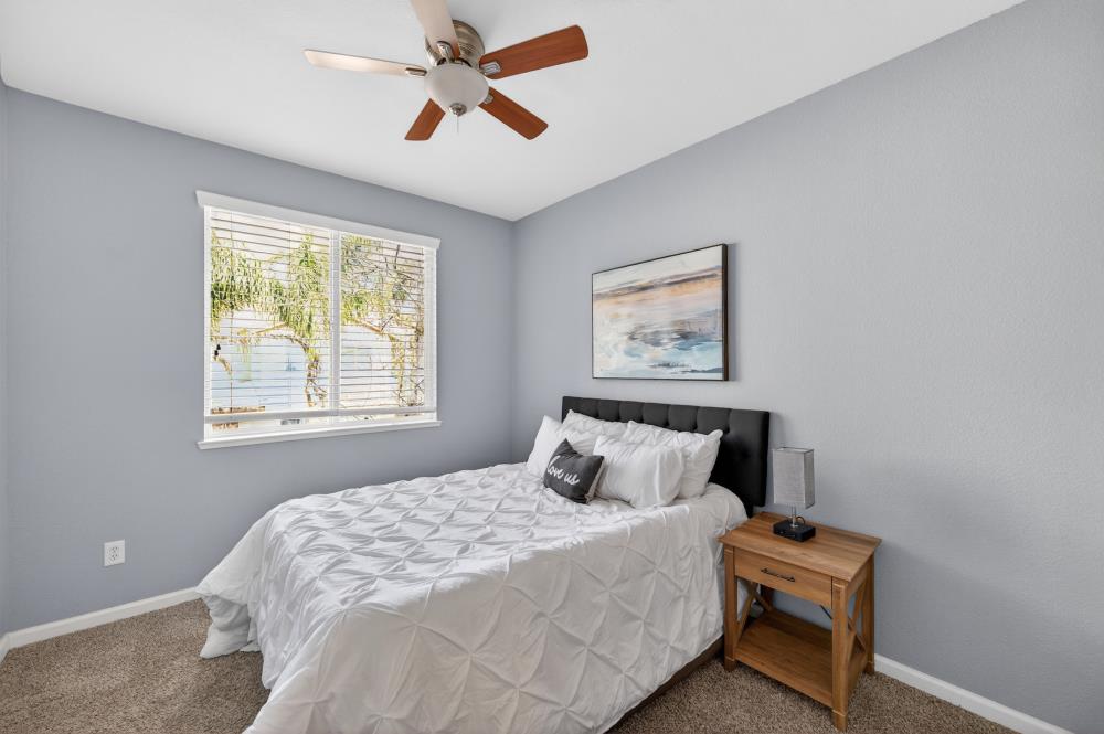 3045 Delta Tule Way Sacramento, CA 95834 - Photo 43 of 65 a bedroom with a bed and a window