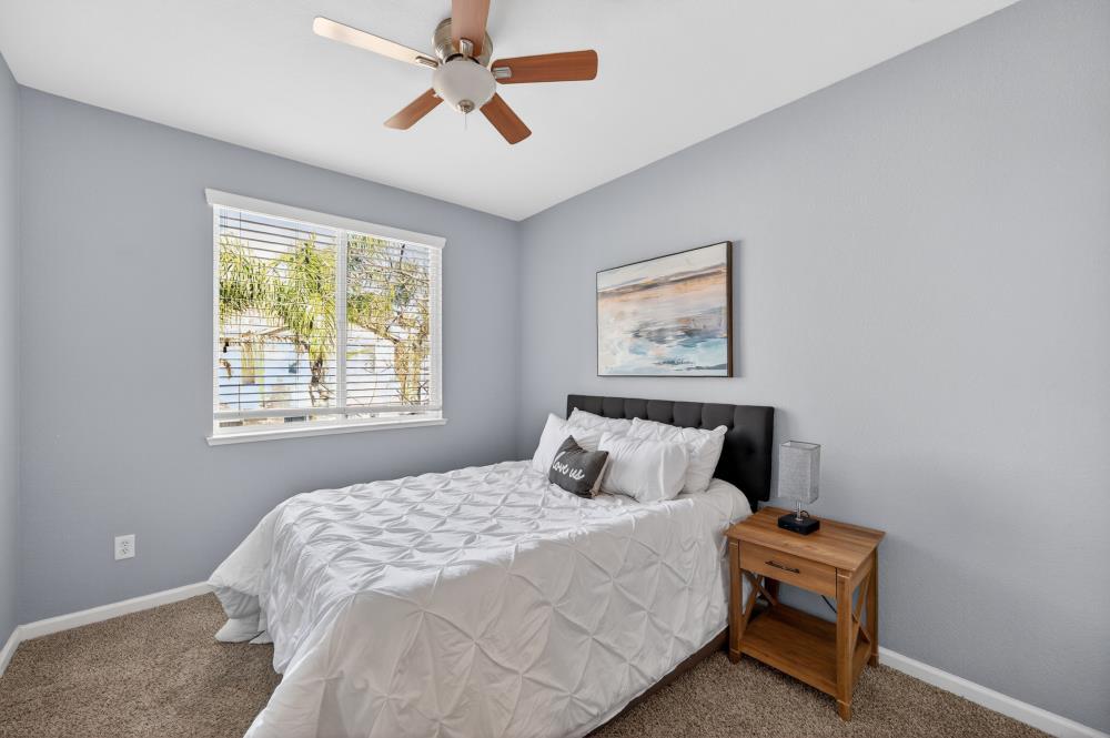 3045 Delta Tule Way Sacramento, CA 95834 - Photo 45 of 65 a bedroom with a bed and a window