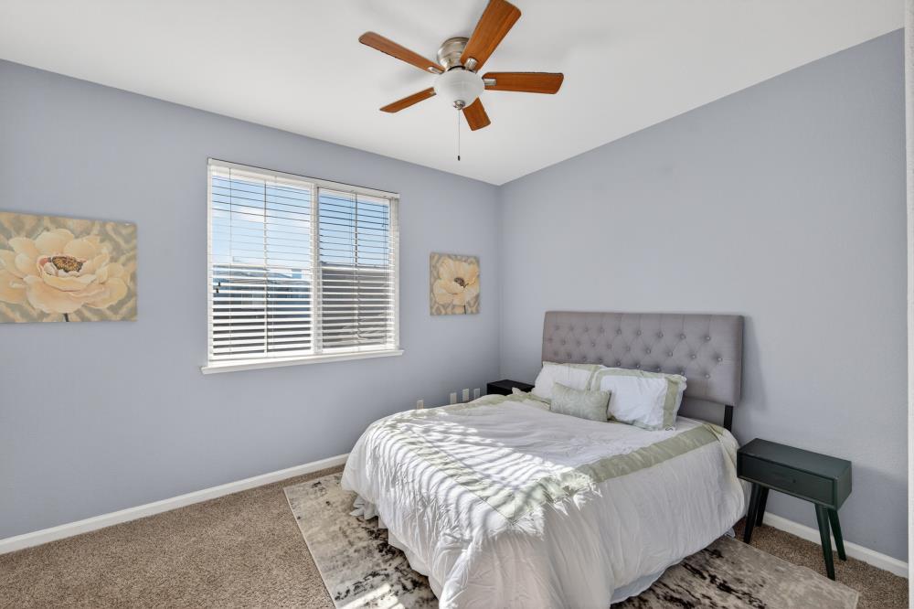 3045 Delta Tule Way Sacramento, CA 95834 - Photo 48 of 65 a bedroom with a bed and a window