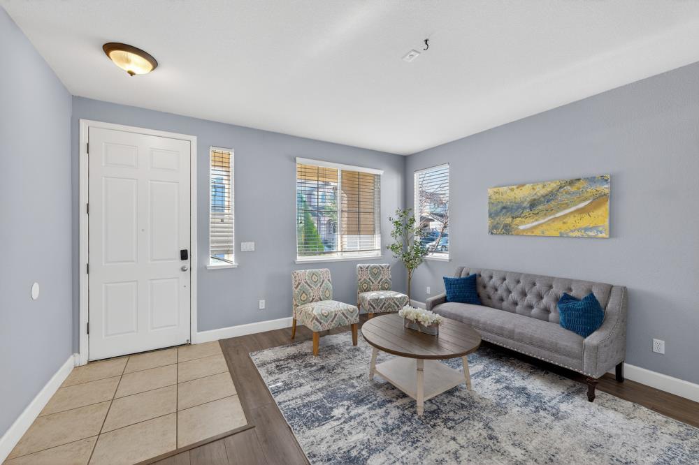 3045 Delta Tule Way Sacramento, CA 95834 - Photo 6 of 65 a living room with furniture and a rug