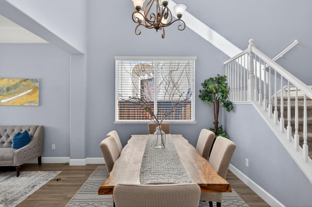 3045 Delta Tule Way Sacramento, CA 95834 - Photo 9 of 65 a view of a dining room with furniture window and wooden floor