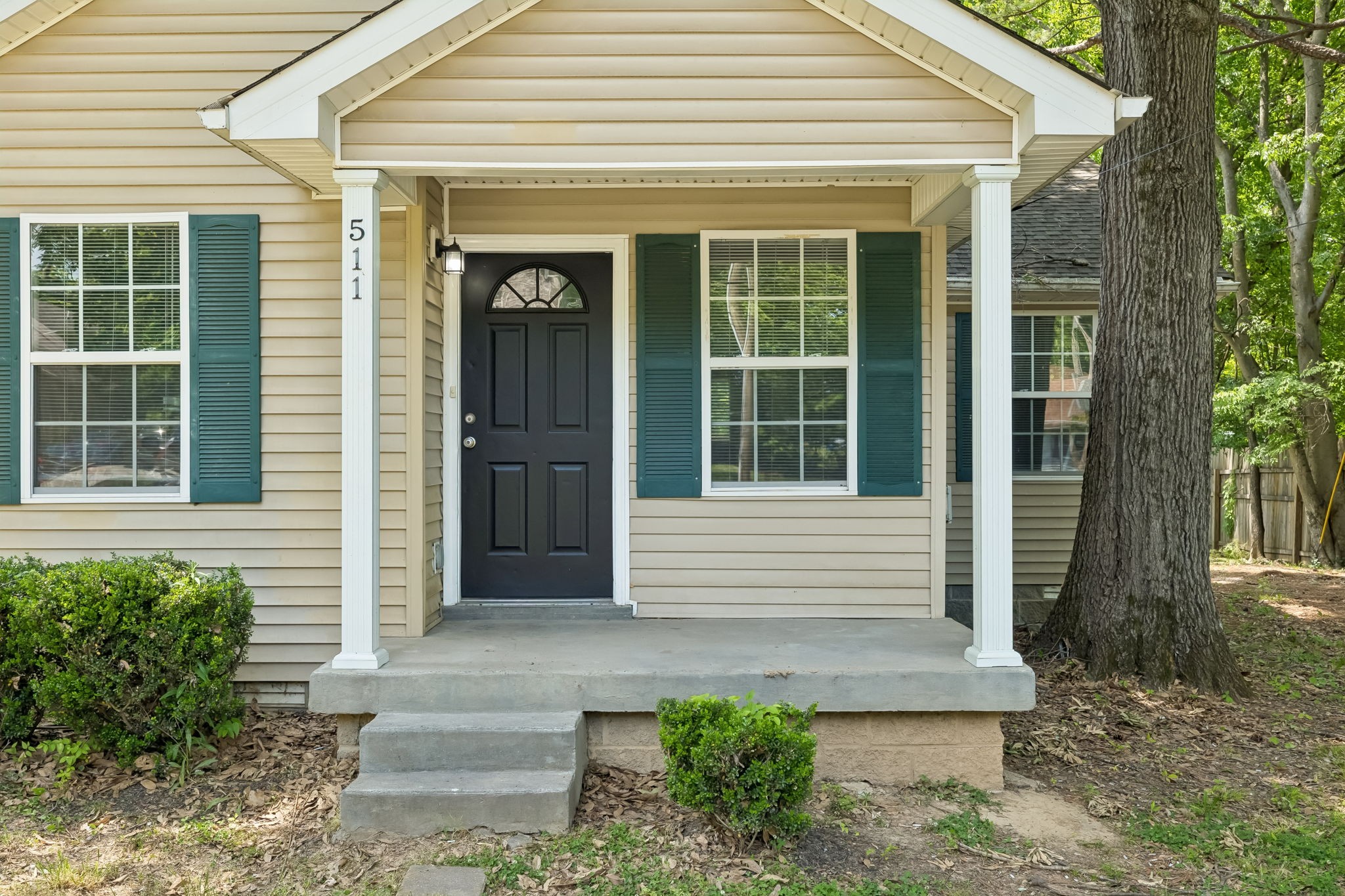 511 Hayes Street Springfield, TN 37172 - Photo 3 of 26 a front view of a house with a yard