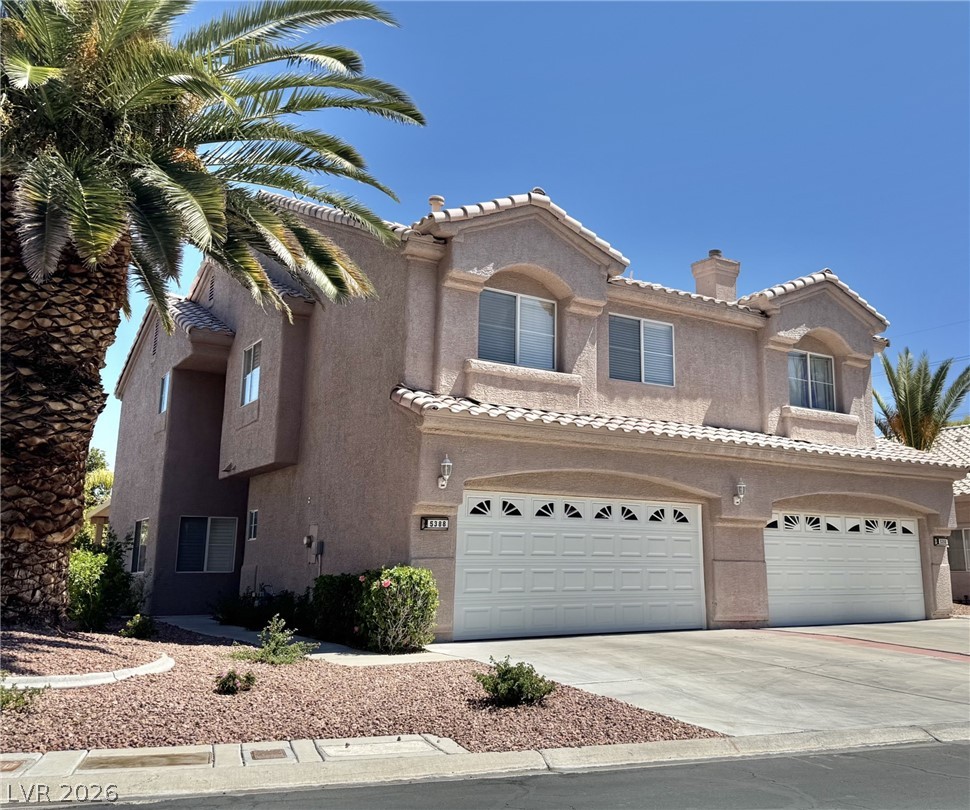 5388 Runningbrook Road Las Vegas, NV 89120 - Photo 1 of 23 A desert-friendly landscape surrounds this stucco residence with twin garage doors and graceful arched windows.