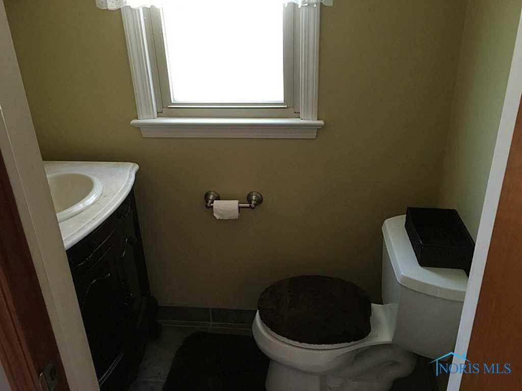 Half Bath. Updated half bath off of Family Room.