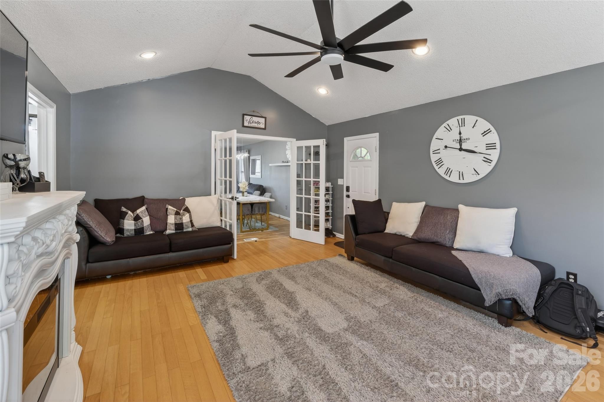 1704 Williams Circle Lancaster, SC 29720 - Photo 11 of 19 a spacious bedroom with a bed a couch and a chandelier