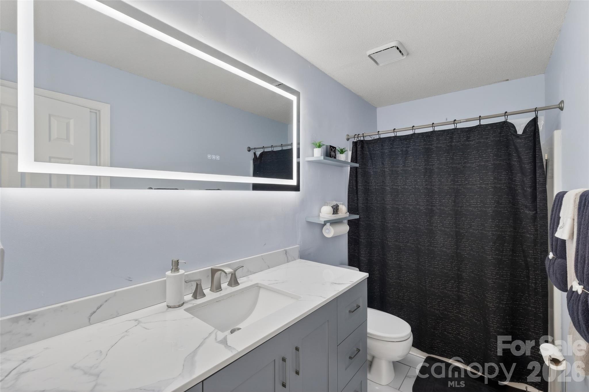 1704 Williams Circle Lancaster, SC 29720 - Photo 15 of 19 a bathroom with a sink toilet and shower
