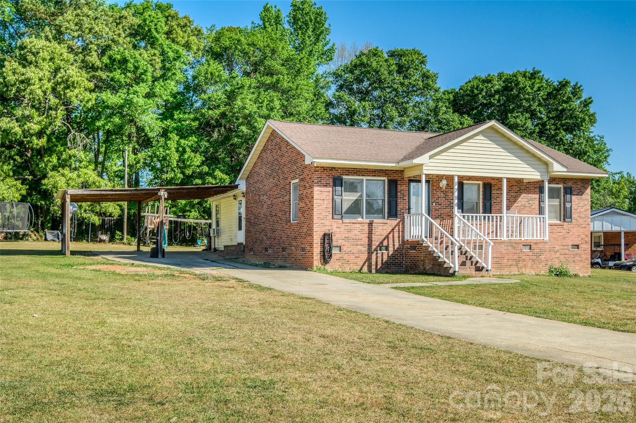 1704 Williams Circle Lancaster, SC 29720 - Photo 2 of 19 a front view of a house with a yard