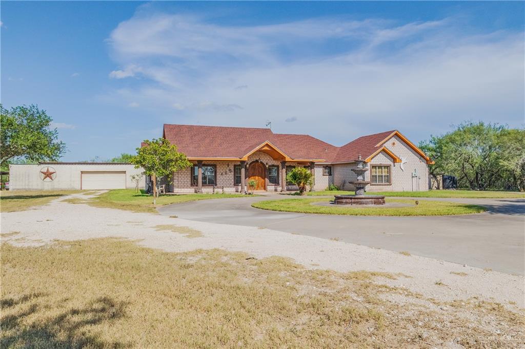 738 County Road 137 Alice, TX 78332 - Photo 2 of 33 a view of houses with outdoor space and swimming pool