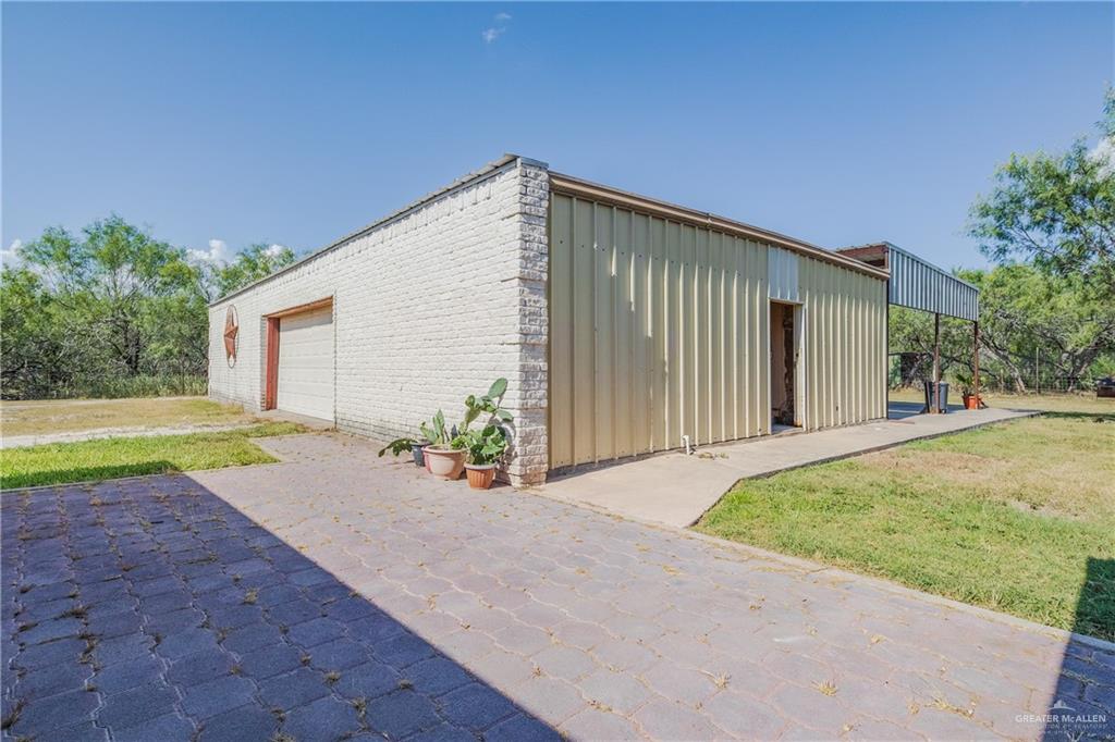 738 County Road 137 Alice, TX 78332 - Photo 21 of 33 a view of a house with backyard and garden