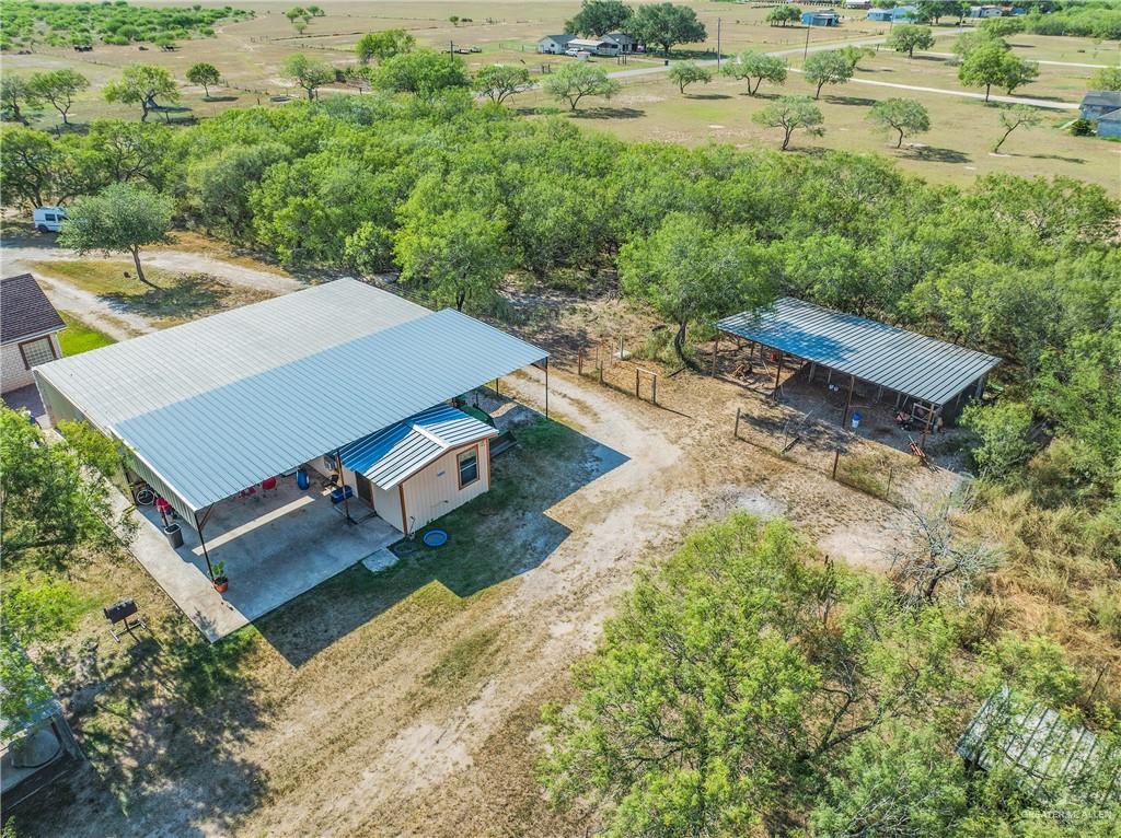 738 County Road 137 Alice, TX 78332 - Photo 30 of 33 an aerial view of a house with yard and lake view