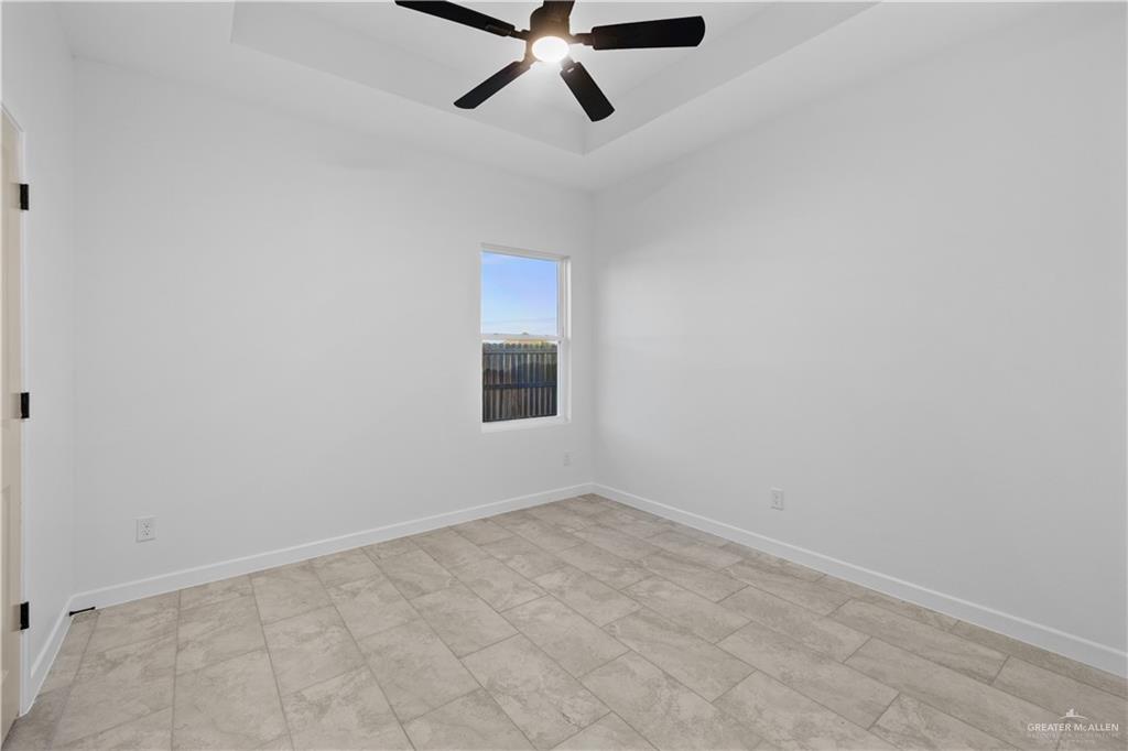 2713 East Comal Road Edinburg, TX 78542 - Photo 22 of 29 a view of an empty room with a window