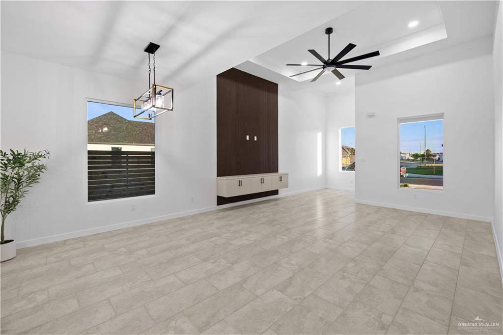 2713 East Comal Road Edinburg, TX 78542 - Photo 6 of 29 a view of an empty room with a window