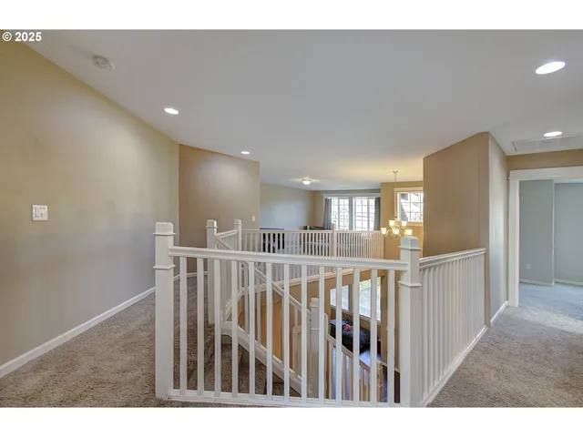 a view of hallway with stairs