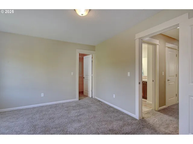 a view of backyard with a garden and plants