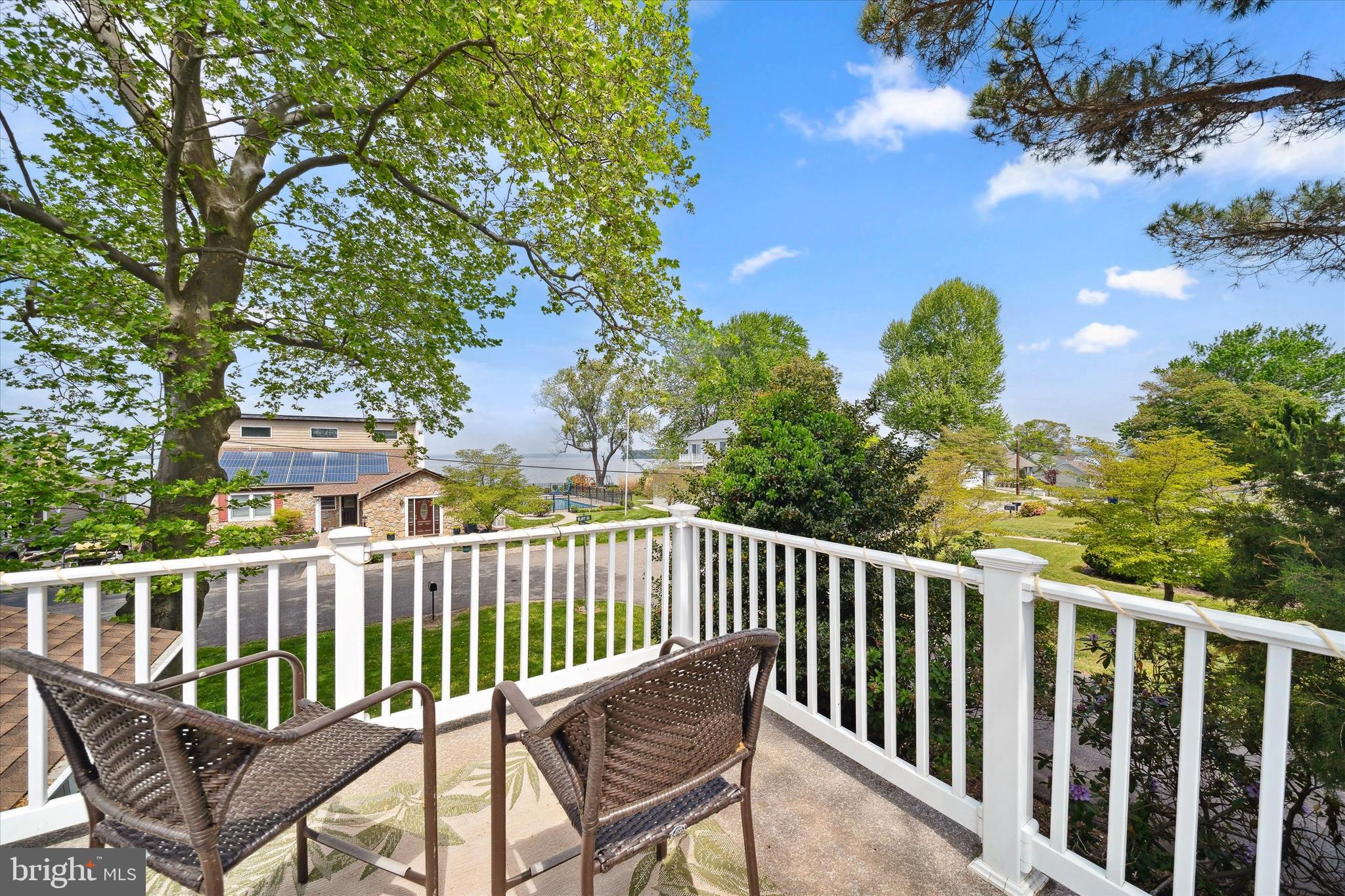 48 Bluff Road Earleville, MD 21919 - Photo 13 of 58 a view of a chair and table on the deck