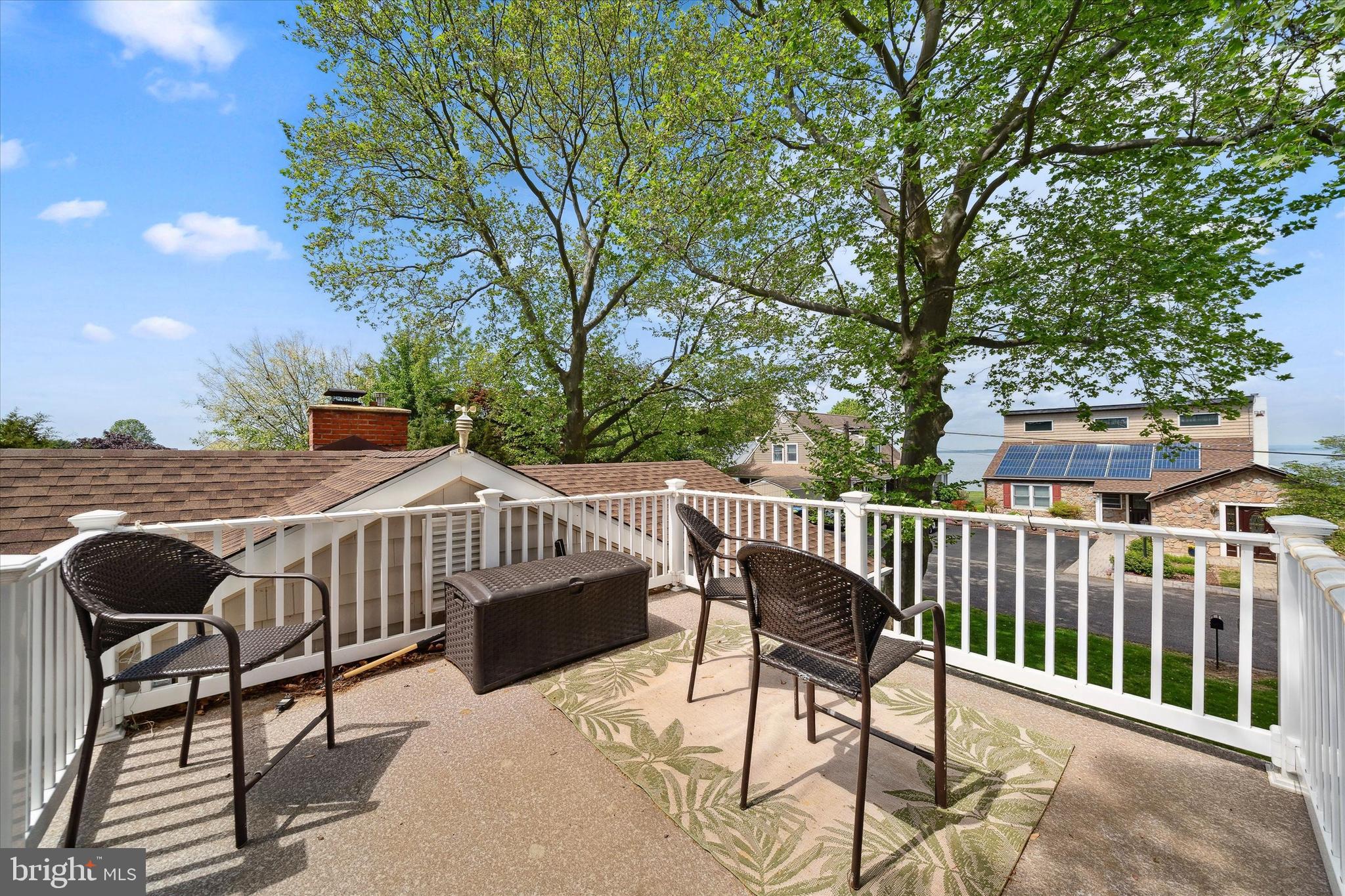 48 Bluff Road Earleville, MD 21919 - Photo 15 of 58 a view of a chair and table on the deck
