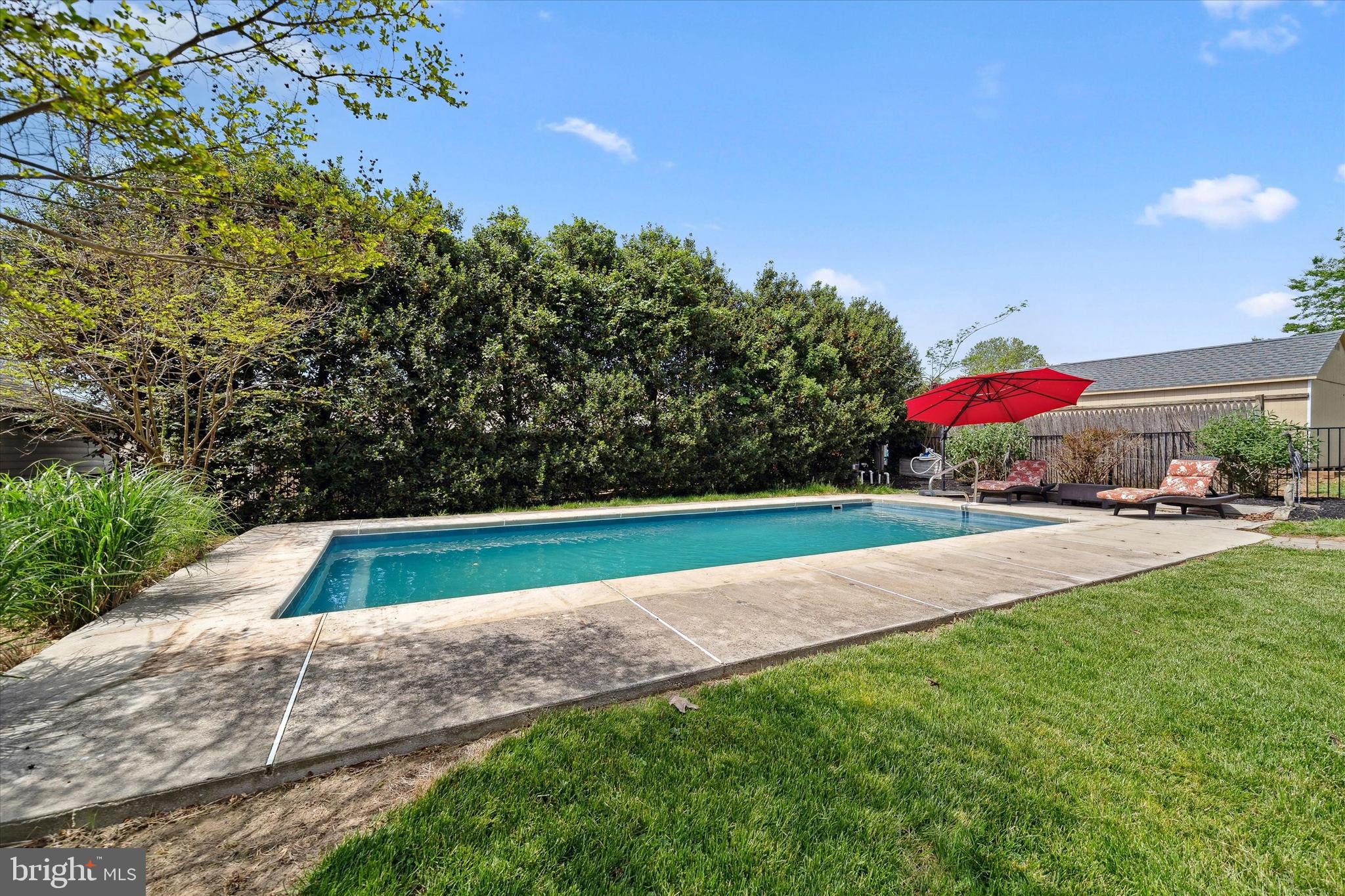48 Bluff Road Earleville, MD 21919 - Photo 17 of 58 a view of yard with swimming pool and green space