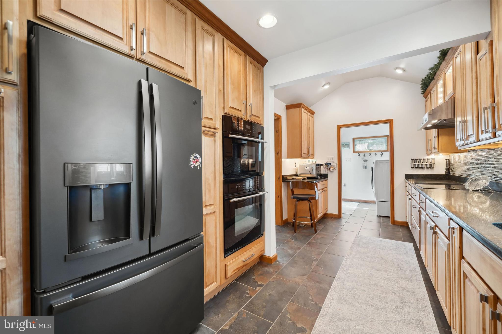 48 Bluff Road Earleville, MD 21919 - Photo 26 of 58 a kitchen with stainless steel appliances a refrigerator and a stove