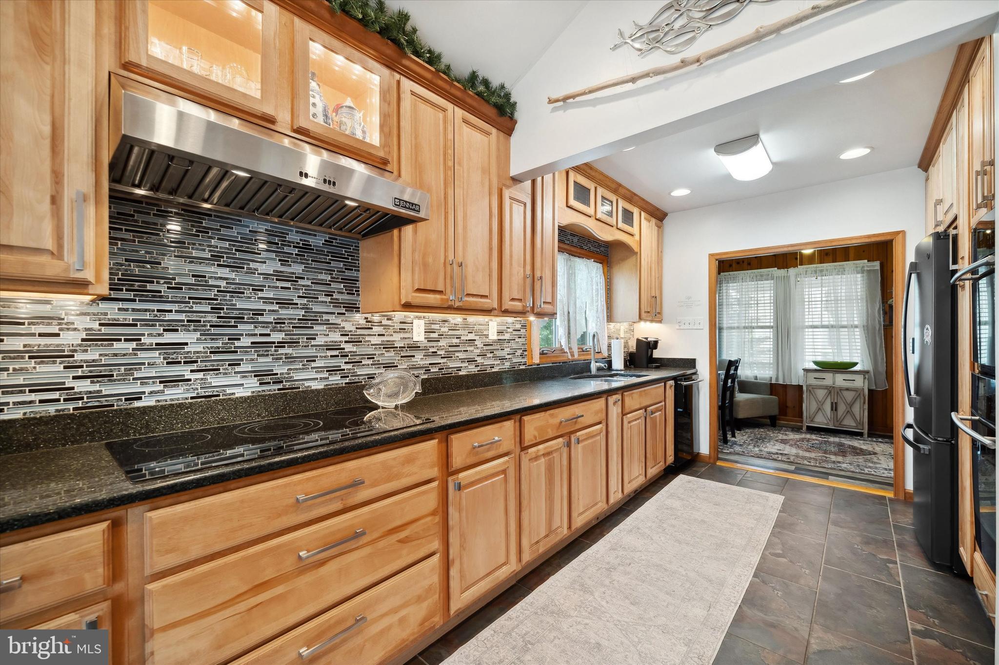 48 Bluff Road Earleville, MD 21919 - Photo 28 of 58 a large bathroom with a sink and a large mirror