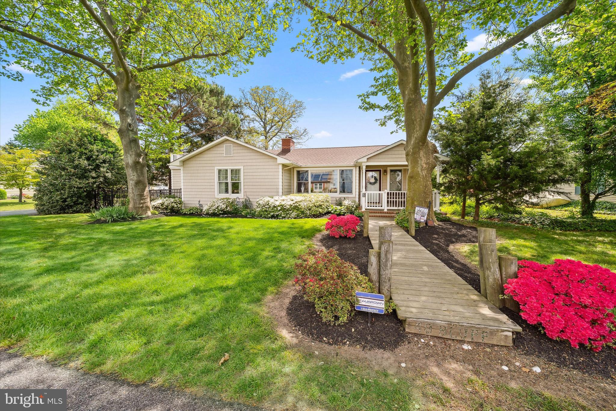 48 Bluff Road Earleville, MD 21919 - Photo 4 of 58 a house that has a tree in front of it