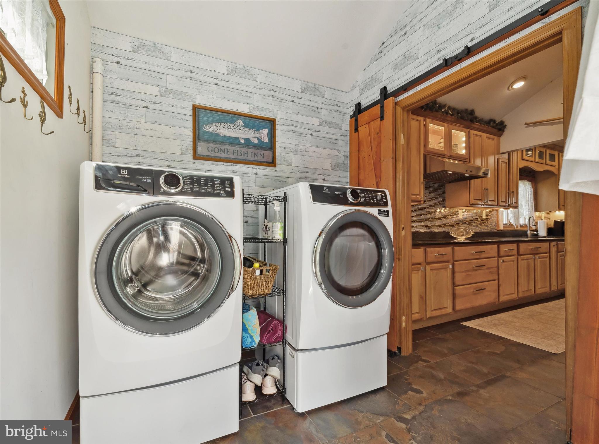 48 Bluff Road Earleville, MD 21919 - Photo 42 of 58 a utility room with dryer and washer