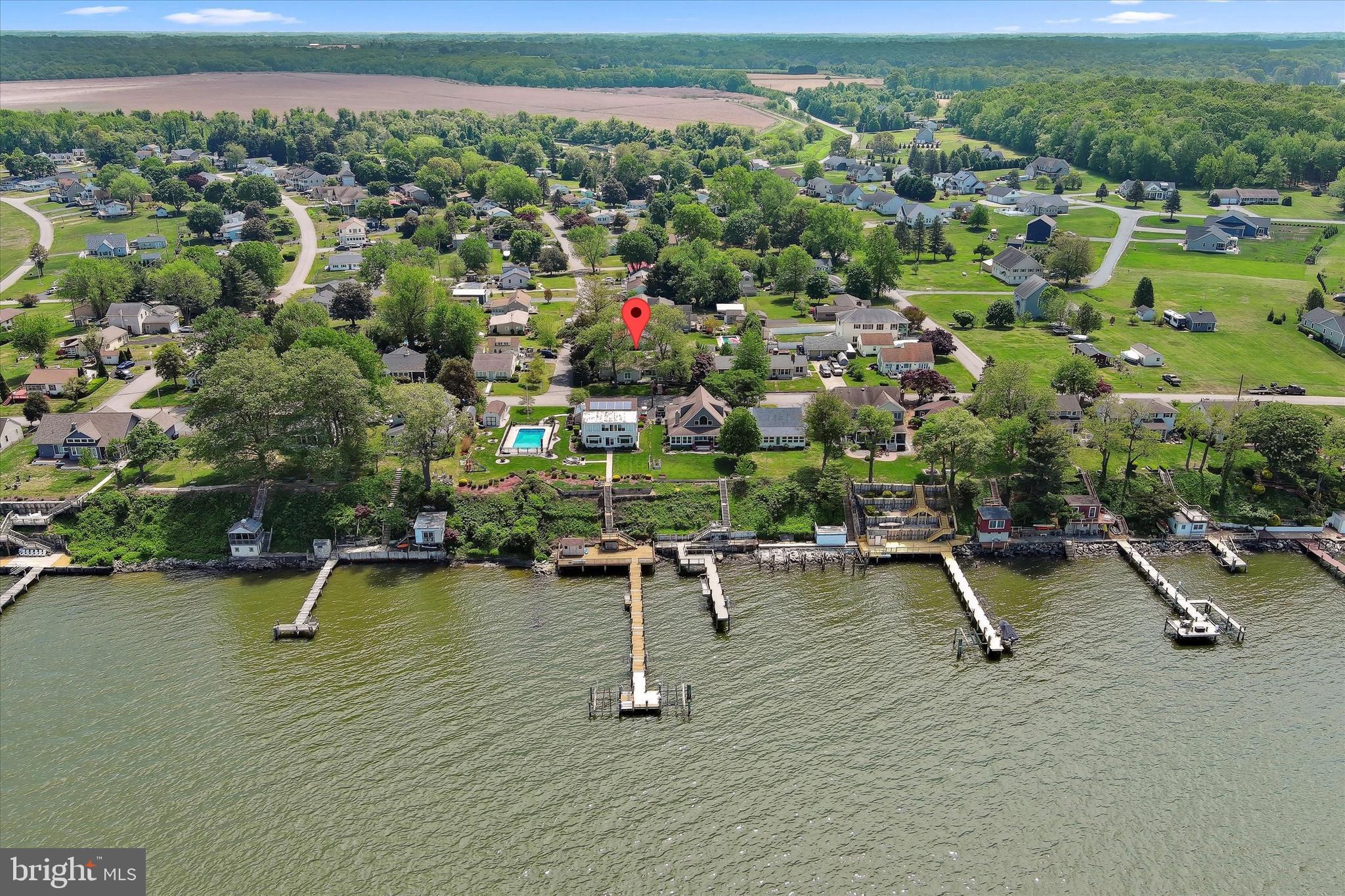 48 Bluff Road Earleville, MD 21919 - Photo 53 of 58 an aerial view of a swimming pool with seating area