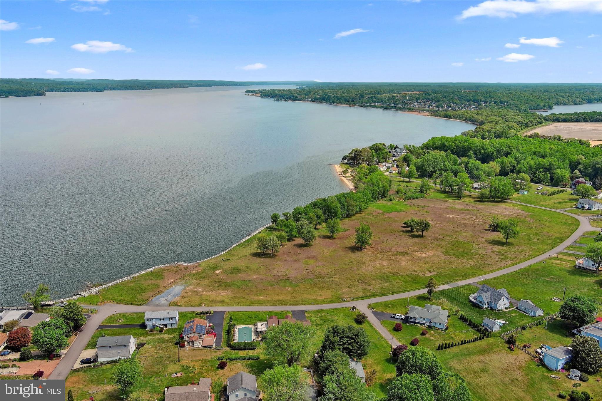 48 Bluff Road Earleville, MD 21919 - Photo 56 of 58 a view of a lake in front of house with outdoor seating