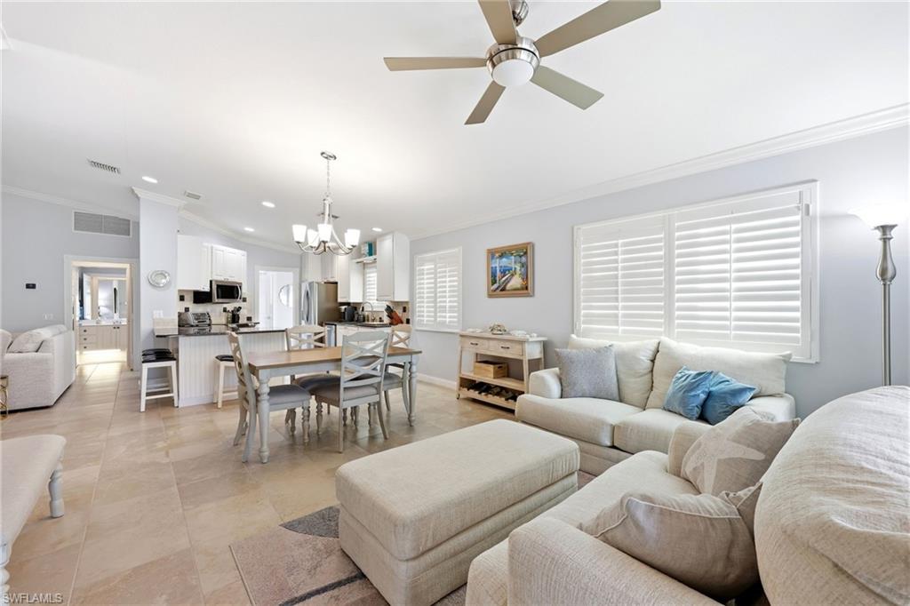 7527 Novara Court Naples, FL 34114 - Photo 12 of 50 View form Den/Living Room to Dining/Kitchen area