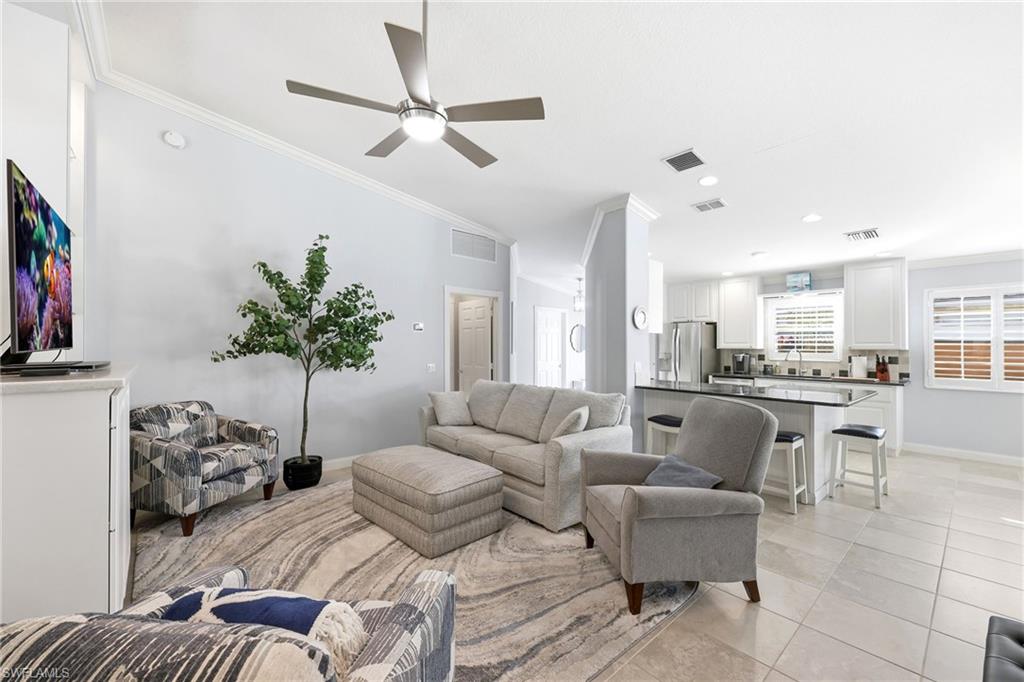 7527 Novara Court Naples, FL 34114 - Photo 21 of 50 View from Living/Entertainment Room to Kitchen