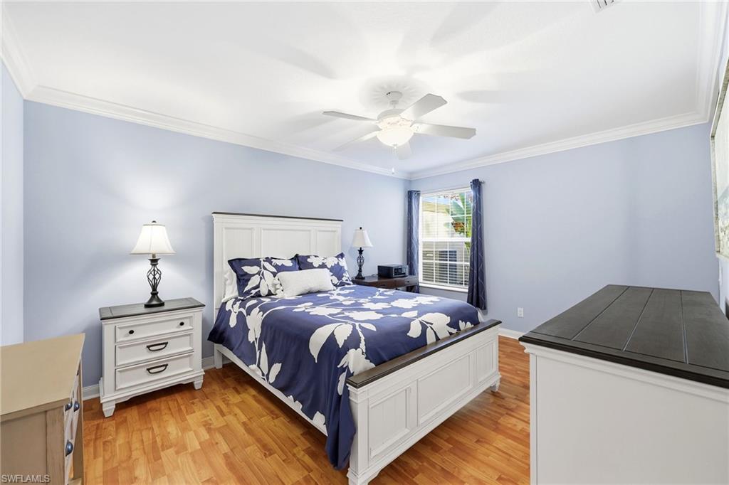 7527 Novara Court Naples, FL 34114 - Photo 26 of 50 Guest Bedroom with hardwood floor