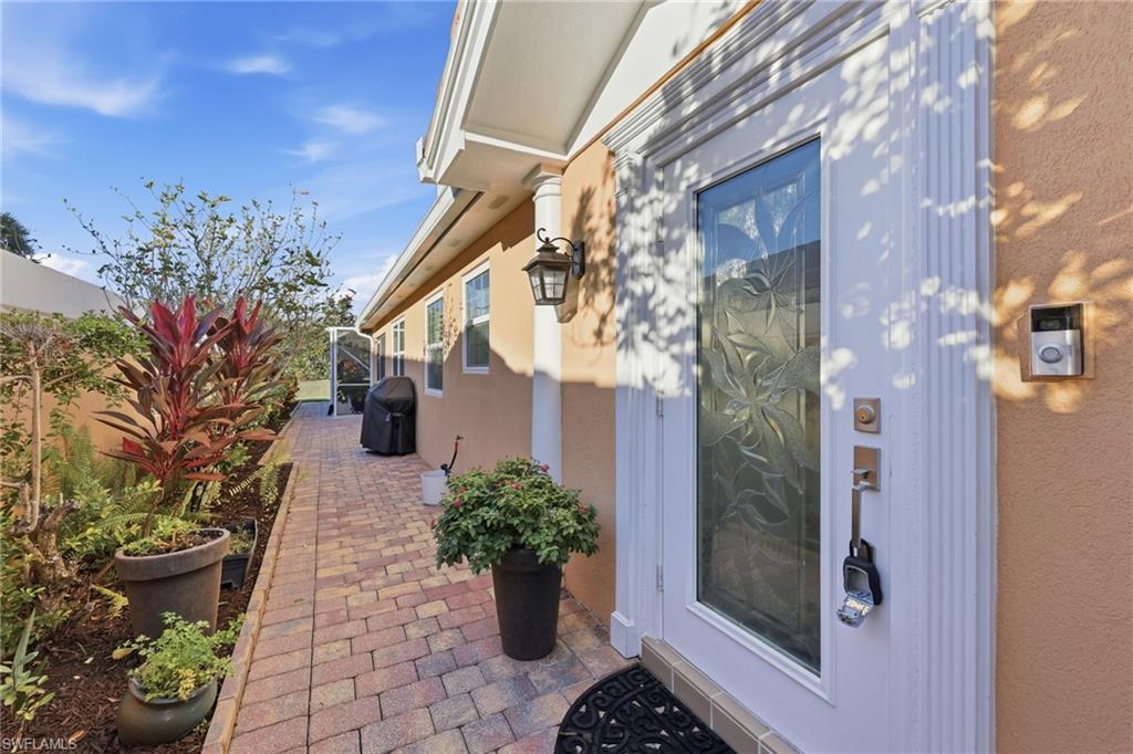 7527 Novara Court Naples, FL 34114 - Photo 3 of 50 Hurricane proof front entry door