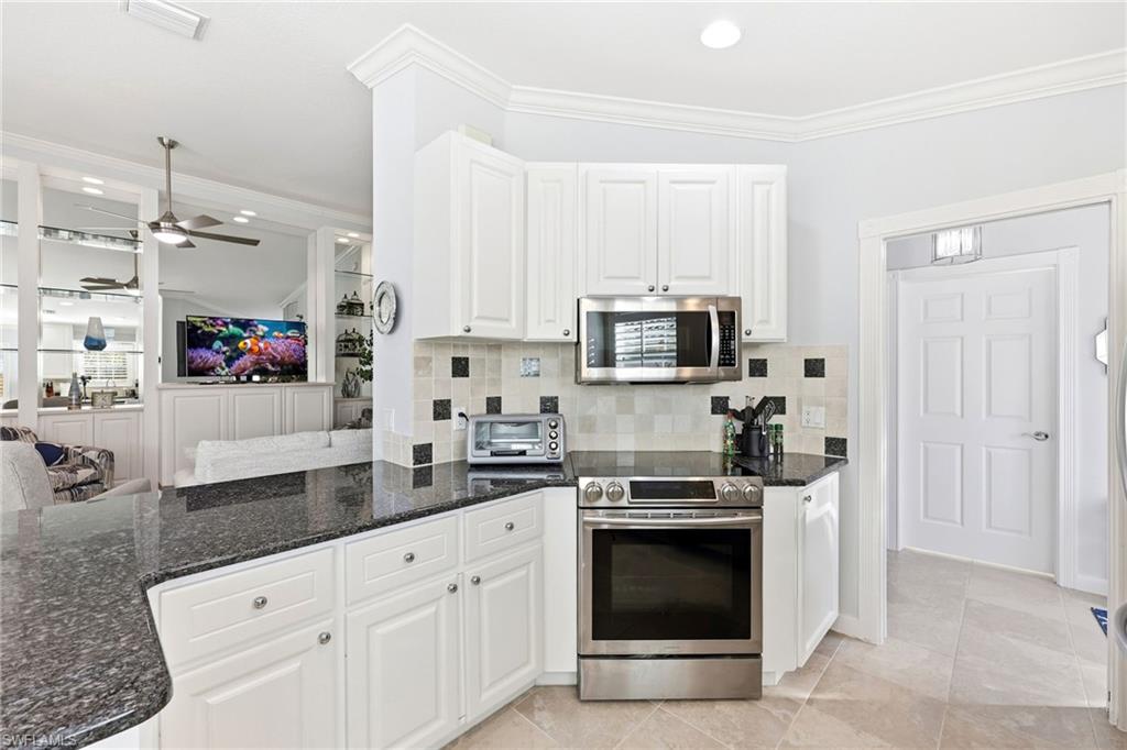 7527 Novara Court Naples, FL 34114 - Photo 6 of 50 Updated Kitchen with access to Foyer