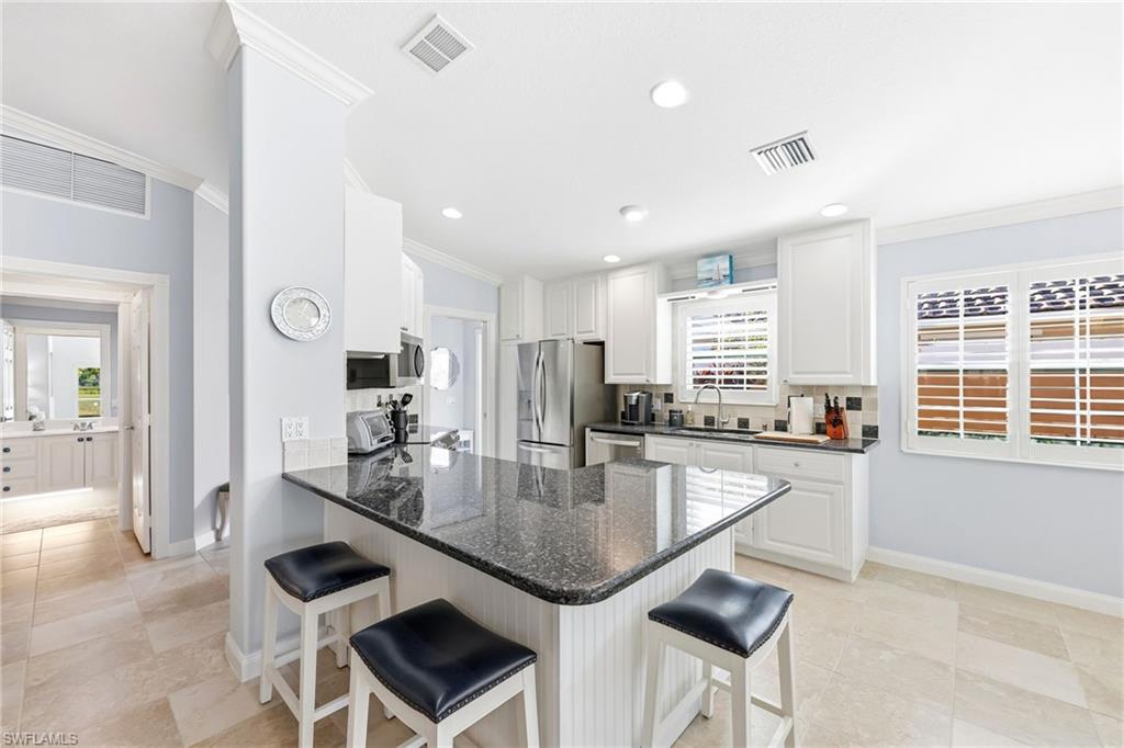 7527 Novara Court Naples, FL 34114 - Photo 8 of 50 Updated Kitchen Island
