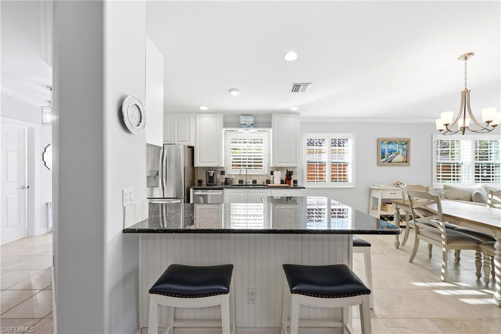 7527 Novara Court Naples, FL 34114 - Photo 9 of 50 open kitchen